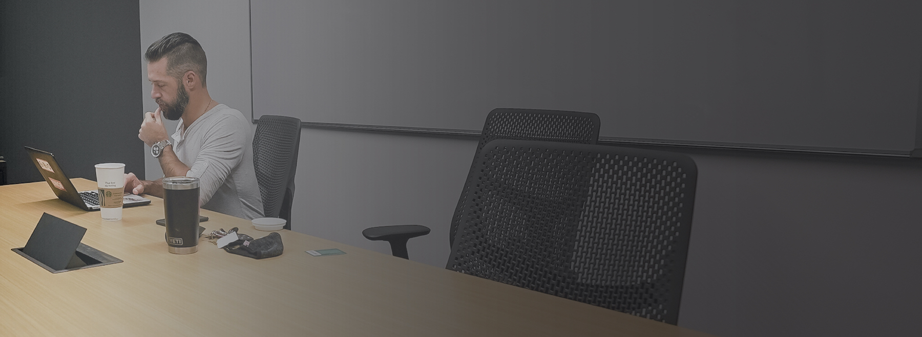 Brian Kight working at his desk
